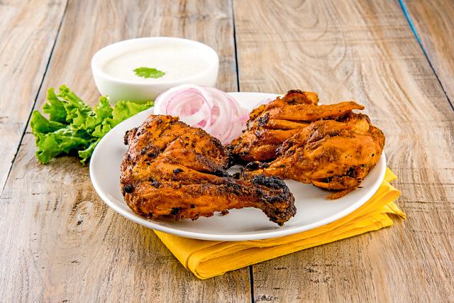 While the tandoor , an intrinsic part of north Indian cooking, supposedly came to India from Afghanistan or Turkey, Tandoori chicken is inherently Indian. (Shutterstock)