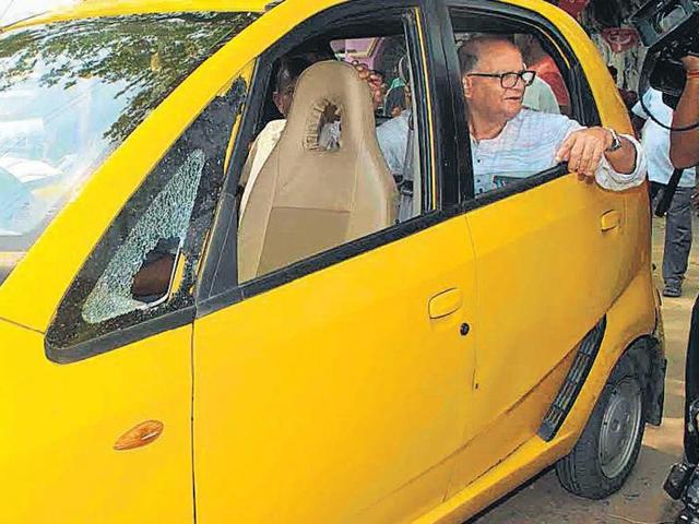 CPM nominee from Singur Rabin Deb rides a Nano during campaigning on Thursday.(Suvojit Basu/HT Photo) CPM nominee from Singur Rabin Deb rides a Nano during campaigning on Thursday.(Suvojit Basu/HT Photo)