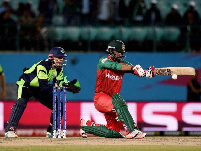 Bangladesh batsman Tamim Iqbal Khan plays a shot against Ireland during the T20 world cup match in Dharamshala. (PTI Photo)