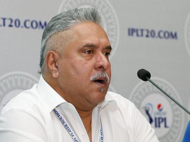 Former owner of Royal Challengers Bengalore, Vijay Mallya (Left) addressing the press during an IPL auction 2014, in Bengaluru.(PTI File Photo)