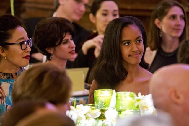 Malia Obama (right) next to actress Sandra Oh (left), listens as her father, President Barack Obama, receives a toast from Canadian Prime Minister Justin Trudeau. (AP Photo) Malia Obama (right) next to actress Sandra Oh (left), listens as her father, President Barack Obama, receives a toast from Canadian Prime Minister Justin Trudeau. (AP Photo)