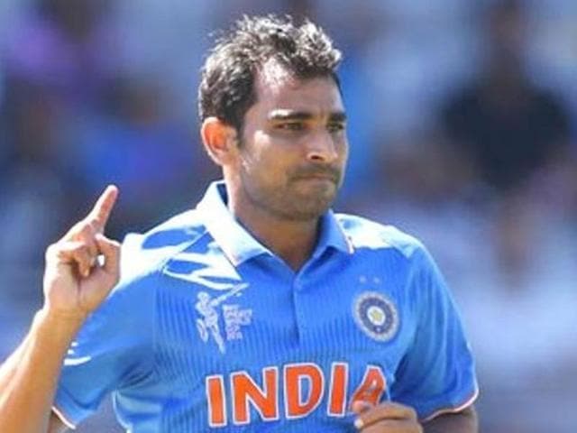 India's bowler Shami celebrate a wicket against West Indies with captain MS Dhoni. (PTI Photo) India's bowler Shami celebrate a wicket against West Indies with captain MS Dhoni. (PTI Photo)