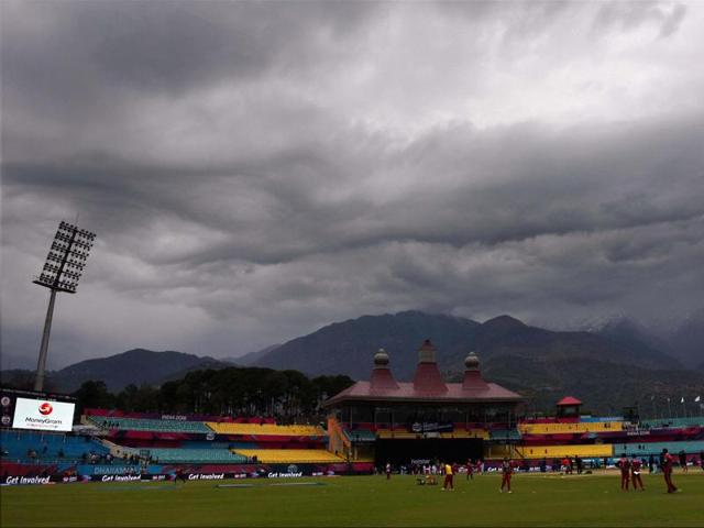 Dark clouds hover over HPCA Stadium during the T20 World Cup match between Oman and Netherlands in Dharamshala. (PTI Photo)