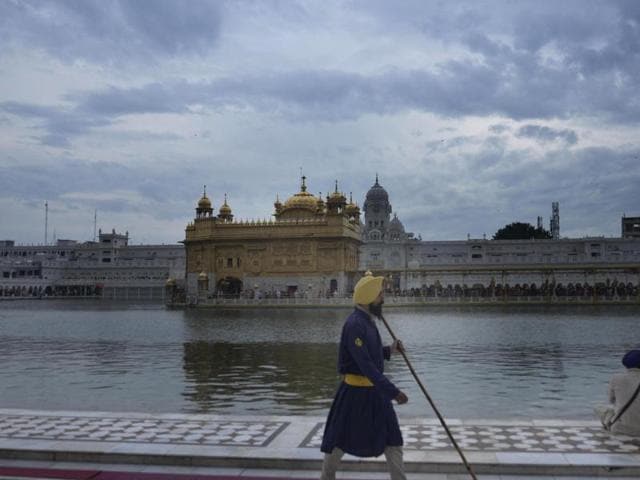 The Golden Temple on a cloudy day in Amritsar on Saturday. (Sameer Sehagl / HT )