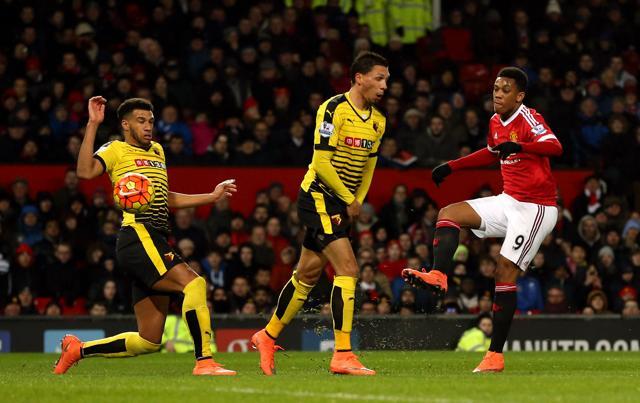 Manchester United's Anthony Martial (R) shoots during the English Premier League football match between Watford and Manchester United at Old Trafford, Manchester. (AP Photo) Manchester United's Anthony Martial (R) shoots during the English Premier League football match between Watford and Manchester United at Old Trafford, Manchester. (AP Photo)