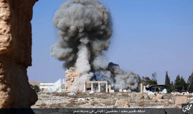 This undated photo released Tuesday, Aug. 25, 2015, file photo, on a social media site used by Islamic State militants, which has been verified and is consistent with other AP reporting, shows smoke from the detonation of the 2,000-year-old temple of Baalshamin in Syria's ancient caravan city of Palmyra. (AP Photo) This undated photo released Tuesday, Aug. 25, 2015, file photo, on a social media site used by Islamic State militants, which has been verified and is consistent with other AP reporting, shows smoke from the detonation of the 2,000-year-old temple of Baalshamin in Syria's ancient caravan city of Palmyra. (AP Photo)