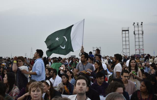 A man waves Pakistan’s flag during the World Culture Festival. (Arvind Yadav/HT Photo) A man waves Pakistan’s flag during the World Culture Festival. (Arvind Yadav/HT Photo)
