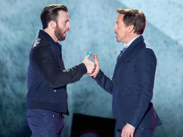 Chris Evans and Robert Downey Jr play thumb war at the Kids' Choice Awards at The Forum. (Matt Sayles/Invision/AP) Chris Evans and Robert Downey Jr play thumb war at the Kids' Choice Awards at The Forum. (Matt Sayles/Invision/AP)