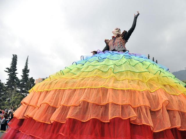 A dancer performs during the inaugural parade in Bogota on Saturday. (AFP) 