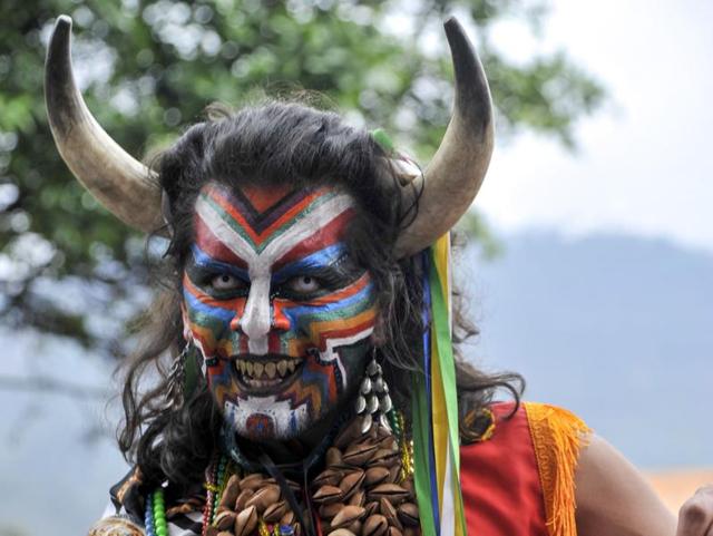 An actor performs during the inaugural parade of the 15th Ibero-American Theatre Festival in Bogota on Saturday. (AFP) 