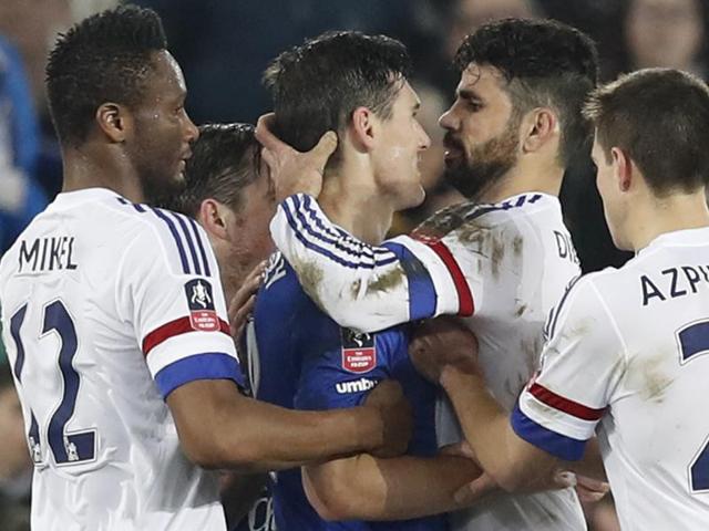 Chelsea's Diego Costa clashes with Everton's Gareth Barry before being sent off. (Reuters Photo) Chelsea's Diego Costa clashes with Everton's Gareth Barry before being sent off. (Reuters Photo)