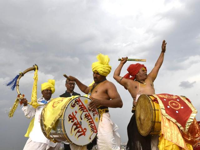 Artists perform a folk dance during the World culture Festival on Yamuna river banks. (Ravi Choudhary/HT Photo) 