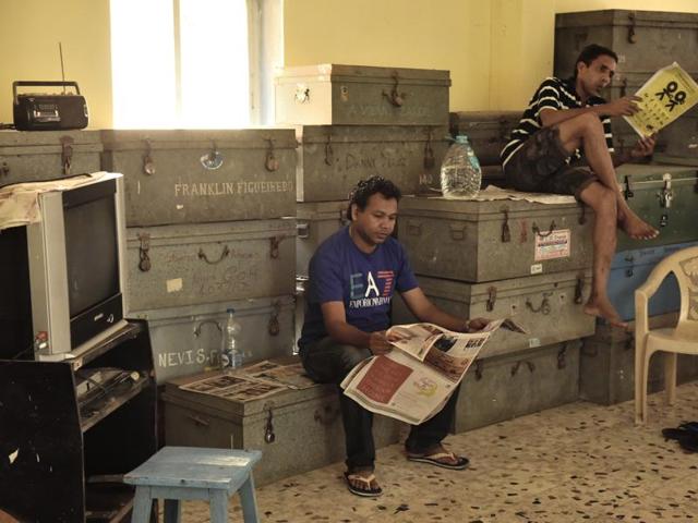Each kudd is named after a Goan village. Members can stay at the club indefinitely, for a monthly rent that now ranges from Rs 50 to Rs 150. Here, Nalvey Fernandes, 35, reads a newspaper at the Club of Carmona near Dhobi Talao. A waiter on a cruise ship, he has already spent a week of his three-month layover at the club. He pays Rs 100 a month. (Arijit Sen/ Hindustan Times) Each kudd is named after a Goan village. Members can stay at the club indefinitely, for a monthly rent that now ranges from Rs 50 to Rs 150. Here, Nalvey Fernandes, 35, reads a newspaper at the Club of Carmona near Dhobi Talao. A waiter on a cruise ship, he has already spent a week of his three-month layover at the club. He pays Rs 100 a month. (Arijit Sen/ Hindustan Times)