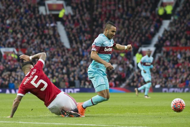 West Ham United's Dimitri Payet (C) falls in the box after a challenge by Manchester United's Marcos Rojo shortly before scoring. (AP Photo) West Ham United's Dimitri Payet (C) falls in the box after a challenge by Manchester United's Marcos Rojo shortly before scoring. (AP Photo)