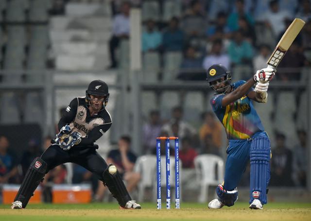New Zealand's Luke Ronchi (L) looks on as Sri Lanka's Angelo Mathews plays a shot during a warm up World T20 cricket tournament match between New Zealand and Sri Lanka. (AFP) New Zealand's Luke Ronchi (L) looks on as Sri Lanka's Angelo Mathews plays a shot during a warm up World T20 cricket tournament match between New Zealand and Sri Lanka. (AFP)