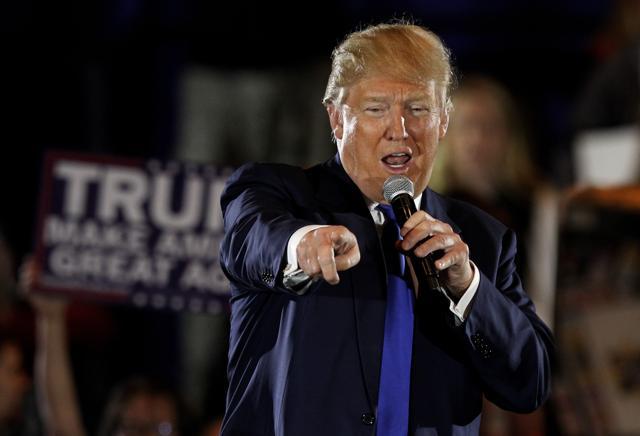 Republican presidential candidate Donald Trump addresses his campaign supporters during a campaign rally at the Savannah Center. (AFP) Republican presidential candidate Donald Trump addresses his campaign supporters during a campaign rally at the Savannah Center. (AFP)