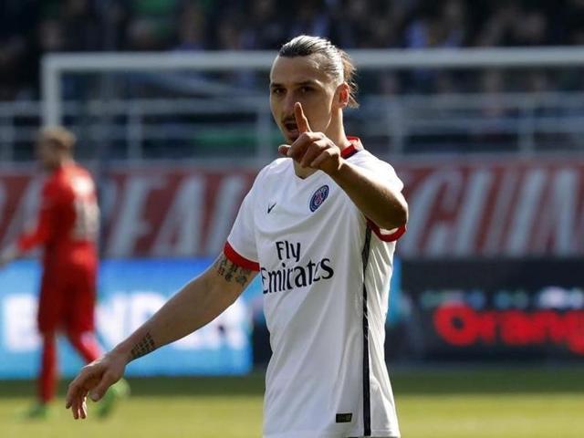 Paris St Germain players Zlatan Ibrahimovic (R) and David Liuiz celebrate their French Ligue 1 title after winning against Troyes. (Reuters Photo) Paris St Germain players Zlatan Ibrahimovic (R) and David Liuiz celebrate their French Ligue 1 title after winning against Troyes. (Reuters Photo)
