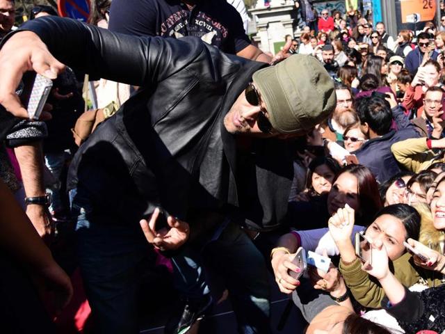 Hrithik Roshan takes a sefie with his fans during a Bollywood flashmob in Madrid. (AFP) 