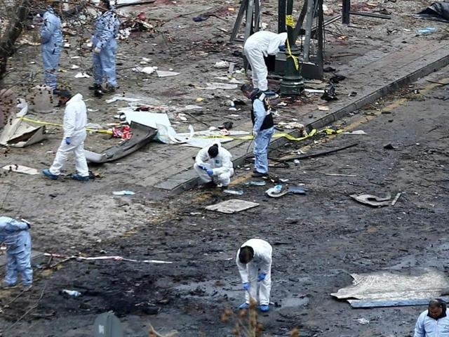 Forensic experts investigate the scene of an explosion the day after a suicide car bomb ripped through a busy square in central Ankara, killing at least 37 people and wounding 125. (AFP Photo) Forensic experts investigate the scene of an explosion the day after a suicide car bomb ripped through a busy square in central Ankara, killing at least 37 people and wounding 125. (AFP Photo)