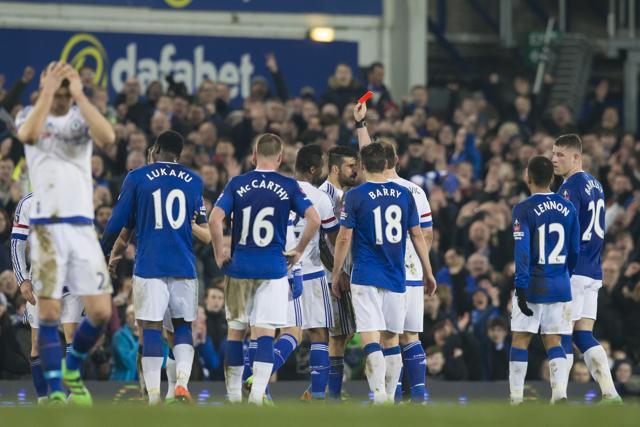 Chelsea's Diego Costa (centre right) is shown a red card by referee Michael Oliver as he is sent off during the English FA Cup quarter-final. (AP Photo)