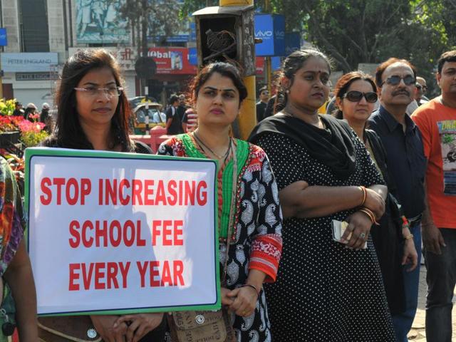 Parents protest against school fee hike at Mahatma Gandhi Square in Indore on Sunday. (Shankar Mourya/HT file photo) Parents protest against school fee hike at Mahatma Gandhi Square in Indore on Sunday. (Shankar Mourya/HT file photo)