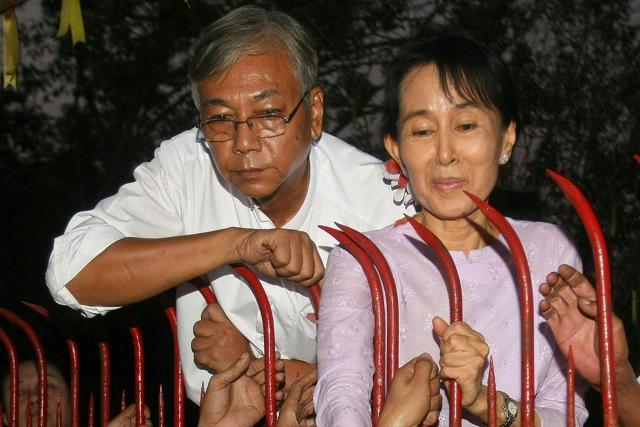 File picture Htin Kyaw (L) with Aung San Suu Kyi (R) at her residence on the day of her release from house arrest in Yangon. (AFP) File picture Htin Kyaw (L) with Aung San Suu Kyi (R) at her residence on the day of her release from house arrest in Yangon. (AFP)