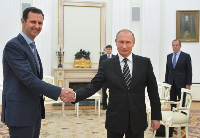 File photo of Russian President Vladimir Putin (Centre) with Syrian President Bashar Assad (Left) in Moscow, Russia. (AP) File photo of Russian President Vladimir Putin (Centre) with Syrian President Bashar Assad (Left) in Moscow, Russia. (AP)