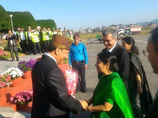 External affairs minister Sushma Swaraj is welcomed by Nepal’s deputy prime minister Kamal Thapa on her arrival in Pokhara on Wednesday. (Twitter) External affairs minister Sushma Swaraj is welcomed by Nepal’s deputy prime minister Kamal Thapa on her arrival in Pokhara on Wednesday. (Twitter)