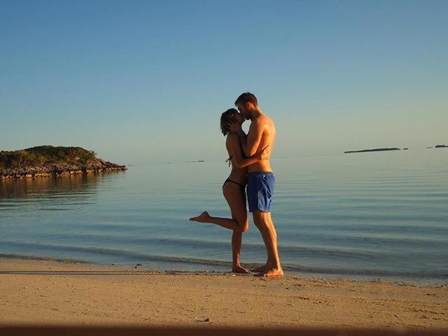 This picture of Taylor Swift and Calvin Harris kissing during their tropical getaway is making our hearts burst.  Here are some more sunny (and adorable) postcards from their vacation.  (Instagram) 