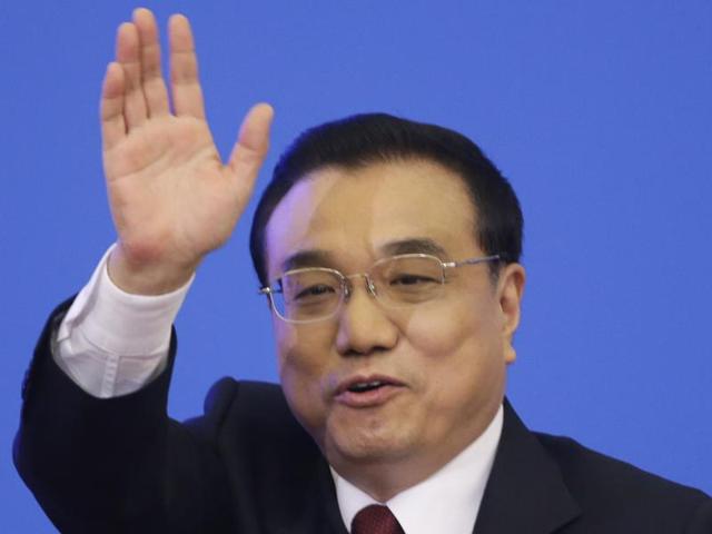 China's Premier Li Keqiang gestures at the end of a news conference following the closing ceremony of the National People's Congress (NPC) at the Great Hall of the People in Beijing. (Reuters) China's Premier Li Keqiang gestures at the end of a news conference following the closing ceremony of the National People's Congress (NPC) at the Great Hall of the People in Beijing. (Reuters)