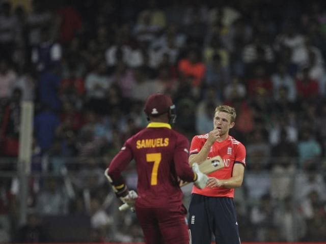 England's David Willey looks on as West Indies’ Marlon Samuels takes a single. (AP Photo) England's David Willey looks on as West Indies’ Marlon Samuels takes a single. (AP Photo)
