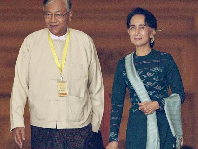 Htin Kyaw, left, newly elected president of Myanmar, walks with National League for Democracy leader Aung San Suu Kyi, right, at Myanmar's parliament in Naypyitaw, Myanmar. (AP) Htin Kyaw, left, newly elected president of Myanmar, walks with National League for Democracy leader Aung San Suu Kyi, right, at Myanmar's parliament in Naypyitaw, Myanmar. (AP)