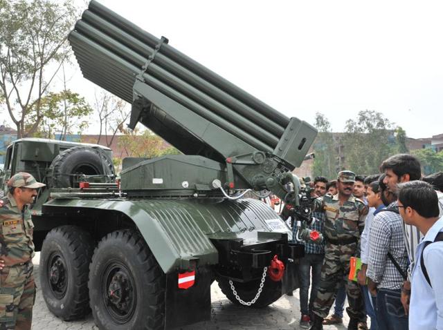 Students being told about missile launching trucks during an army exhibition at Lovely Professional University, on the outskirts of Jalandhar. (Pardeep Pandit/HT Photo)