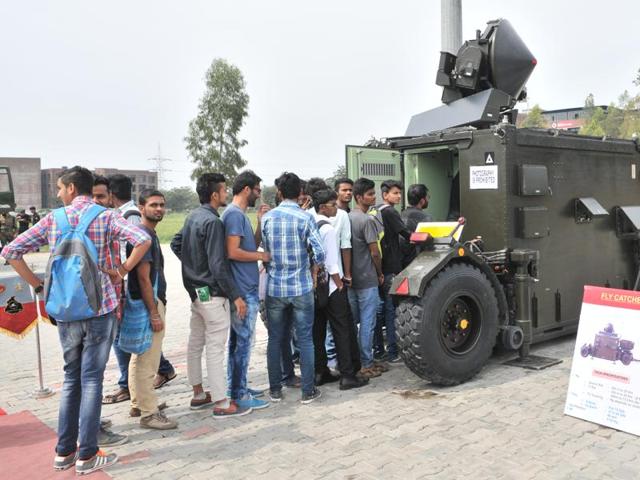 Students wait in a queue to have an in-depth look at a Fly Catcher WPN control system. (Pardeep Pandit/HT Photo)