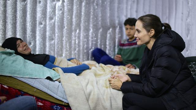 A handout picture made available by the United Nations High Commission for Refugees (UNHCR) on March 15, 2016 shows UNHCR special envoy US actress Angelina Jolie meeting with Syrian refugees. (AFP) A handout picture made available by the United Nations High Commission for Refugees (UNHCR) on March 15, 2016 shows UNHCR special envoy US actress Angelina Jolie meeting with Syrian refugees. (AFP)