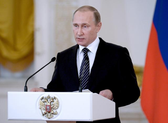 Russian President Vladimir Putin delivers a speech at a ceremony to present state awards to Russian military personnel who fought in Syria at the Kremlin in Moscow, on March 17, 2016. Russia has been accused by a prominent Syrian human rights body of killing Syrian civilians “on a daily continuous basis.” (AFP Photo) Russian President Vladimir Putin delivers a speech at a ceremony to present state awards to Russian military personnel who fought in Syria at the Kremlin in Moscow, on March 17, 2016. Russia has been accused by a prominent Syrian human rights body of killing Syrian civilians “on a daily continuous basis.” (AFP Photo)