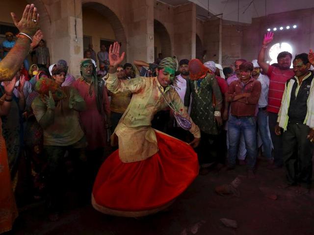The next day when the women would flock in to Nandgaon, the menfolk would return the favour by throwing colour (gulal) at them. (REUTERS) 