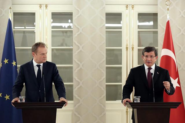 A handout picture released by the Turkish prime minister's office shows Turkish Prime Minister Ahmet Davutoglu (R) and EU Council president Donald Tusk holding a press conference following a meeting at the Cankaya Palace in Ankara. (AFP) A handout picture released by the Turkish prime minister's office shows Turkish Prime Minister Ahmet Davutoglu (R) and EU Council president Donald Tusk holding a press conference following a meeting at the Cankaya Palace in Ankara. (AFP)