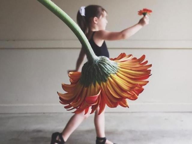 Instagram’s latest Weekend Hashtag Project is calling on people to share photos that play tricks on the eyes.  Here’s a girl with a flower for skirt. (Instagram/mlnordan) 