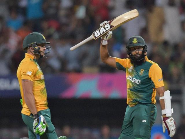 South Africa’s Hashim Amla (R) acknowledges crowd after completing his half-century, as Faf du Plessis watches. (PTI ) South Africa’s Hashim Amla (R) acknowledges crowd after completing his half-century, as Faf du Plessis watches. (PTI )