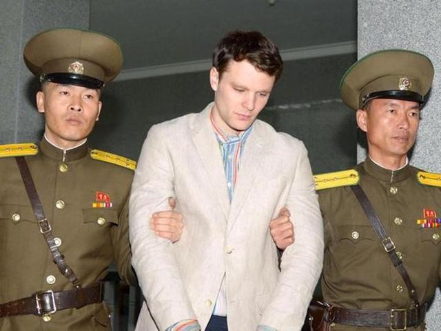 Otto Frederick Warmbier (C), a University of Virginia student who was detained in North Korea since early January, is taken to North Korea's top court in Pyongyang, North Korea.(Reuters / Kyodo)