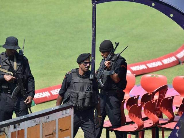 Commandos keep a strict vigil during the Pakistan team’s practice session at the Eden Gardens in Kolkata on Thursday. (PTI Photo) Commandos keep a strict vigil during the Pakistan team’s practice session at the Eden Gardens in Kolkata on Thursday. (PTI Photo)