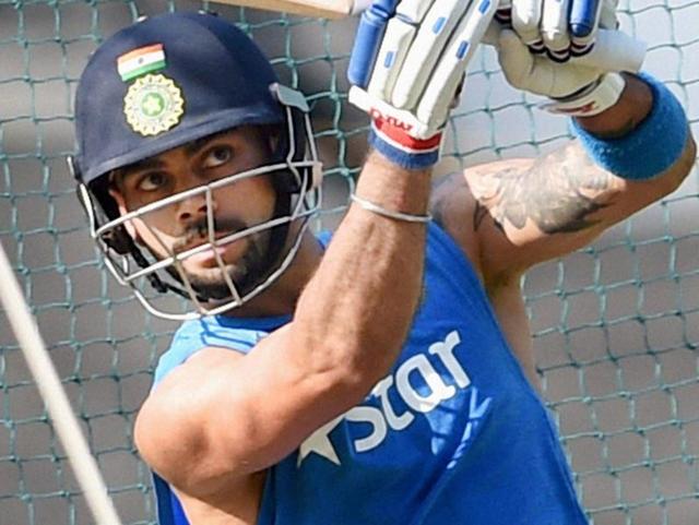 Virat Kohli bats in the nets during a practice session in Nagpur.(PTI Photo)