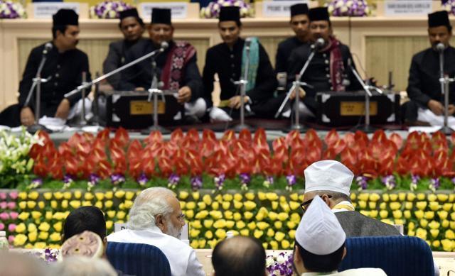 Prime Minister Narendra Modi listens as artists perform at the opening ceremony of World Sufi Forum at Vigyan Bhawan in New Delhi on Thursday. (PTI) Prime Minister Narendra Modi listens as artists perform at the opening ceremony of World Sufi Forum at Vigyan Bhawan in New Delhi on Thursday. (PTI)