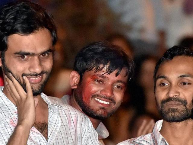 JNU student Umar Khalid (with mike) with other students in New Delhiion Friday, March 18, 2016, after his release from jail on interim bail. (Arun Sharma /Hindustan Times) JNU student Umar Khalid (with mike) with other students in New Delhiion Friday, March 18, 2016, after his release from jail on interim bail. (Arun Sharma /Hindustan Times)