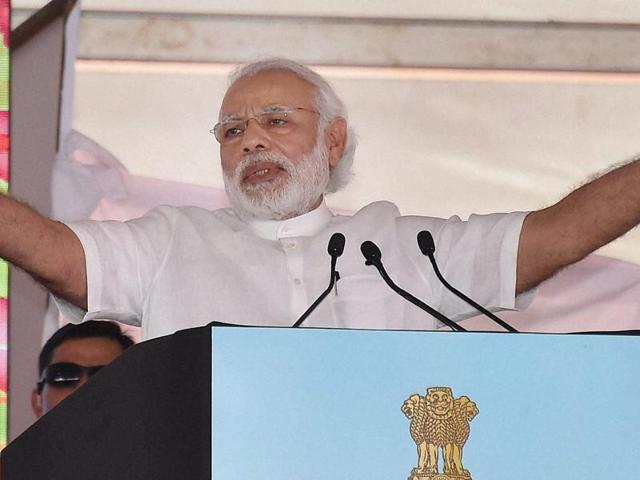 Prime Minister Narendra Modi giving away Krishi Karman Award to a Rajasthan farmer for outstanding performance in agriculture at Krishi Unnati Mela in New Delhi on Saturday.(PTI) Prime Minister Narendra Modi giving away Krishi Karman Award to a Rajasthan farmer for outstanding performance in agriculture at Krishi Unnati Mela in New Delhi on Saturday.(PTI)