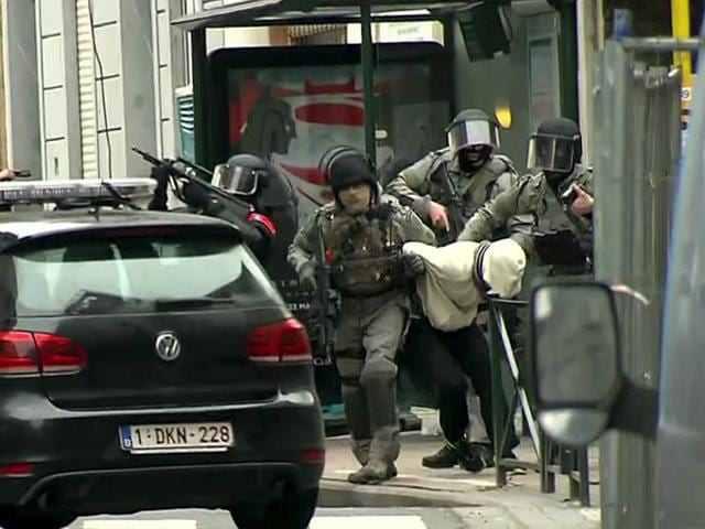 Armed Belgian police apprehend Salah Abdeslam, one of the main suspects from November's Paris attacks, in Molenbeek near Brussels, Belgium on Friday. (Reuters) Armed Belgian police apprehend Salah Abdeslam, one of the main suspects from November's Paris attacks, in Molenbeek near Brussels, Belgium on Friday. (Reuters)