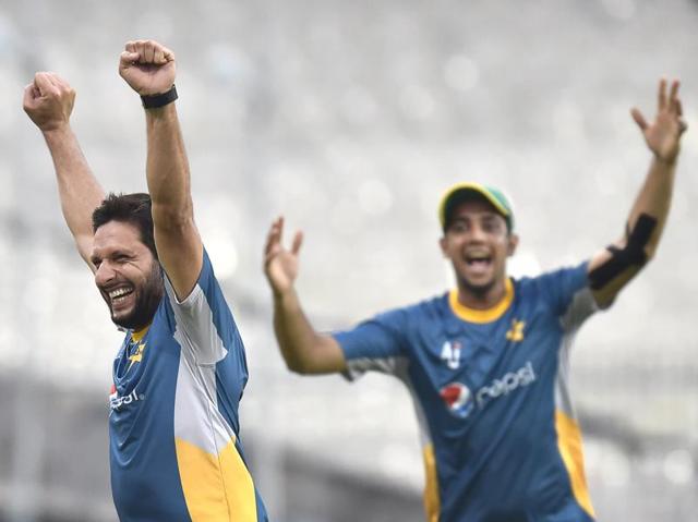 Shahid Afridi and teammates enjoying themselves during a game of football. (Ajay Aggarwal/HT Photo)