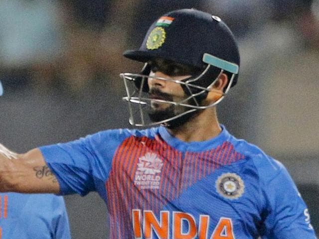 India's Virat Kohli celebrates his fifty runs during the ICC World Twenty20 2016 cricket match against Pakistan. (AP Photo) India's Virat Kohli celebrates his fifty runs during the ICC World Twenty20 2016 cricket match against Pakistan. (AP Photo)