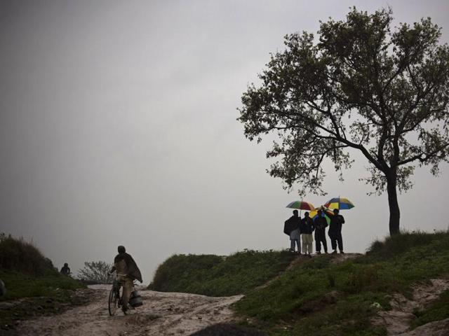 Eight school children were among nine people feared dead in an avalanche triggered by heavy rains in Pakistan. (AP Photo) Eight school children were among nine people feared dead in an avalanche triggered by heavy rains in Pakistan. (AP Photo)